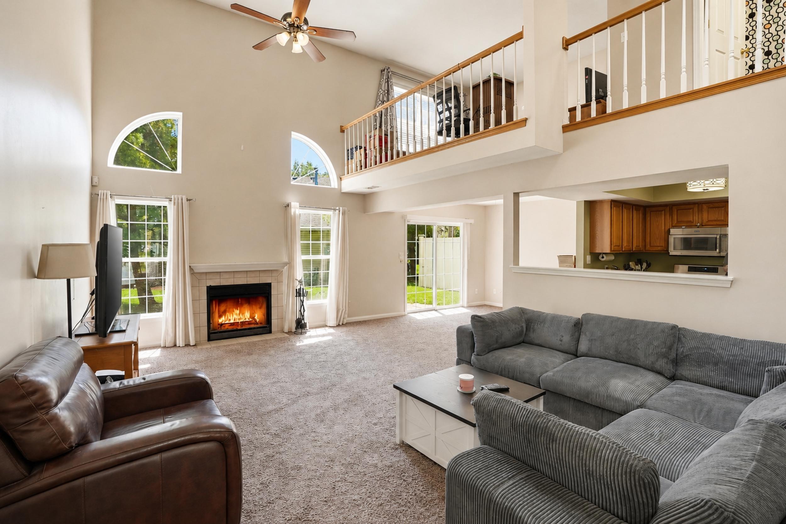 2184 Timberidge Lane Highland, IN 46322 - Photo 2 of 18 a living room with furniture and a fireplace