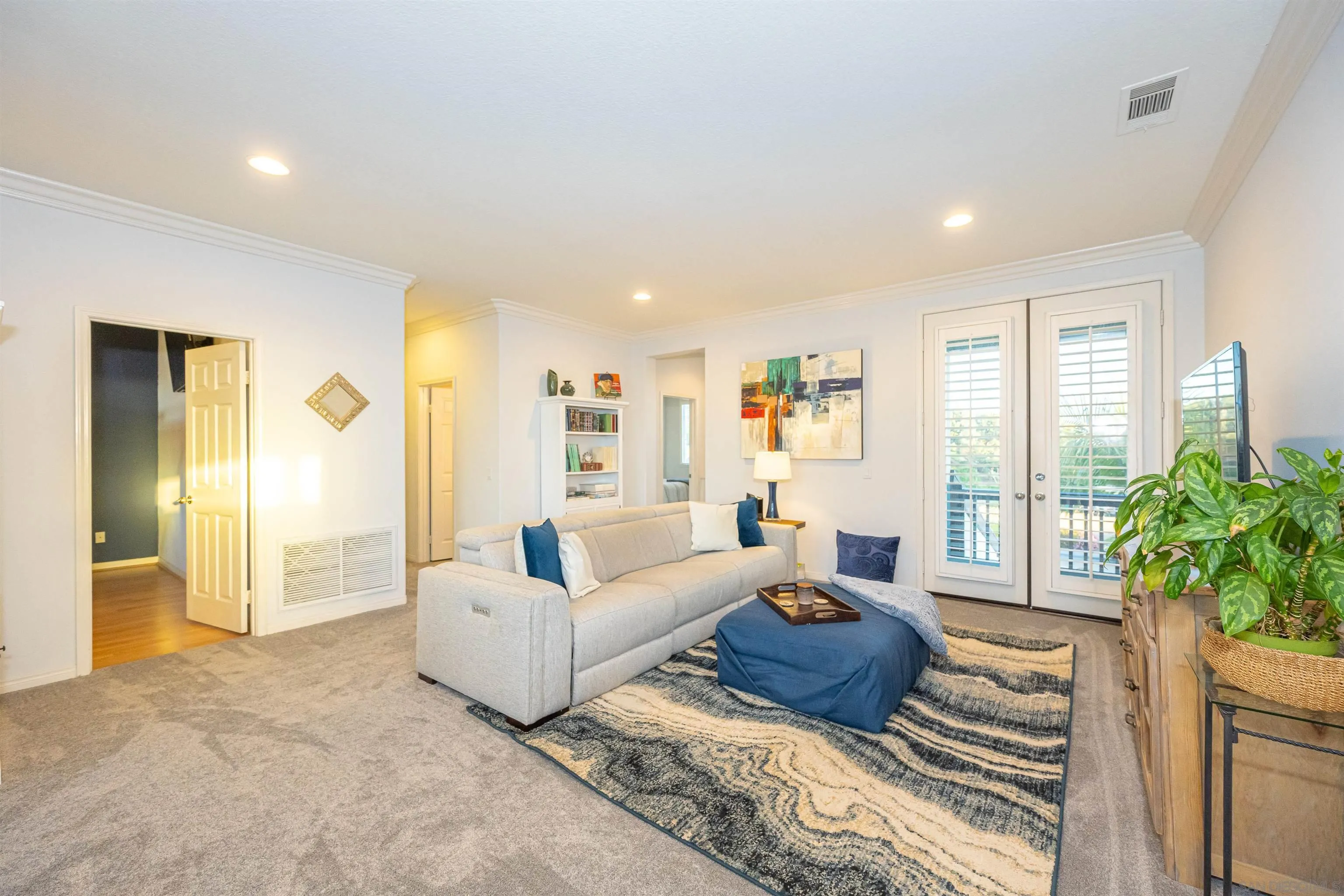 1540 Weatherly Road Carlsbad, CA 92011 - Photo 13 of 58 a living room with furniture and a large window