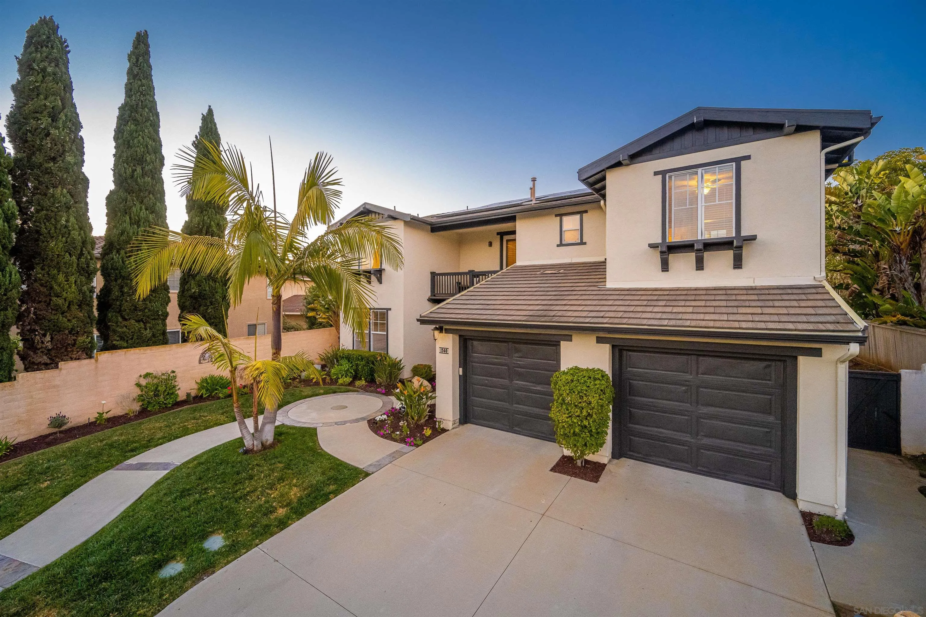 1540 Weatherly Road Carlsbad, CA 92011 - Photo 17 of 58 a front view of a house with a yard