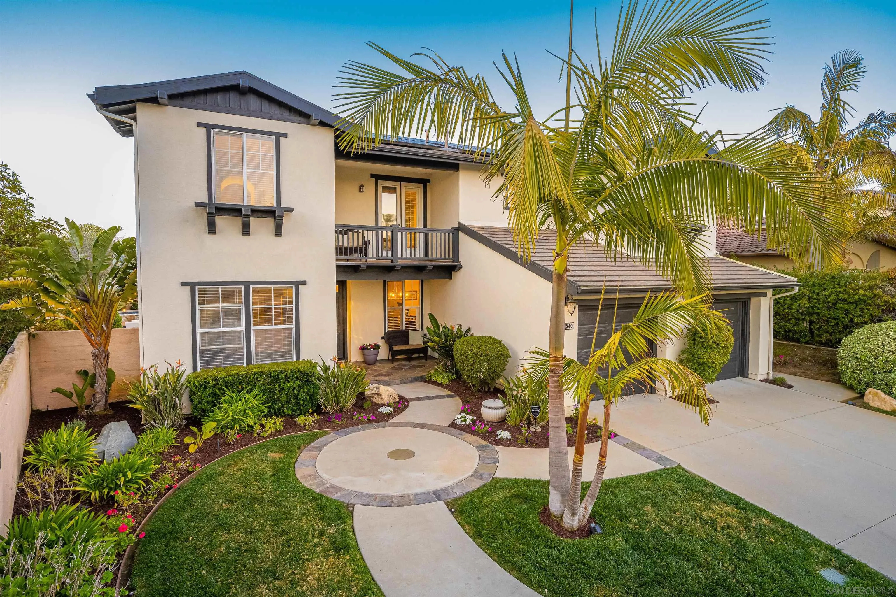 1540 Weatherly Road Carlsbad, CA 92011 - Photo 18 of 58 a front view of a house with garden