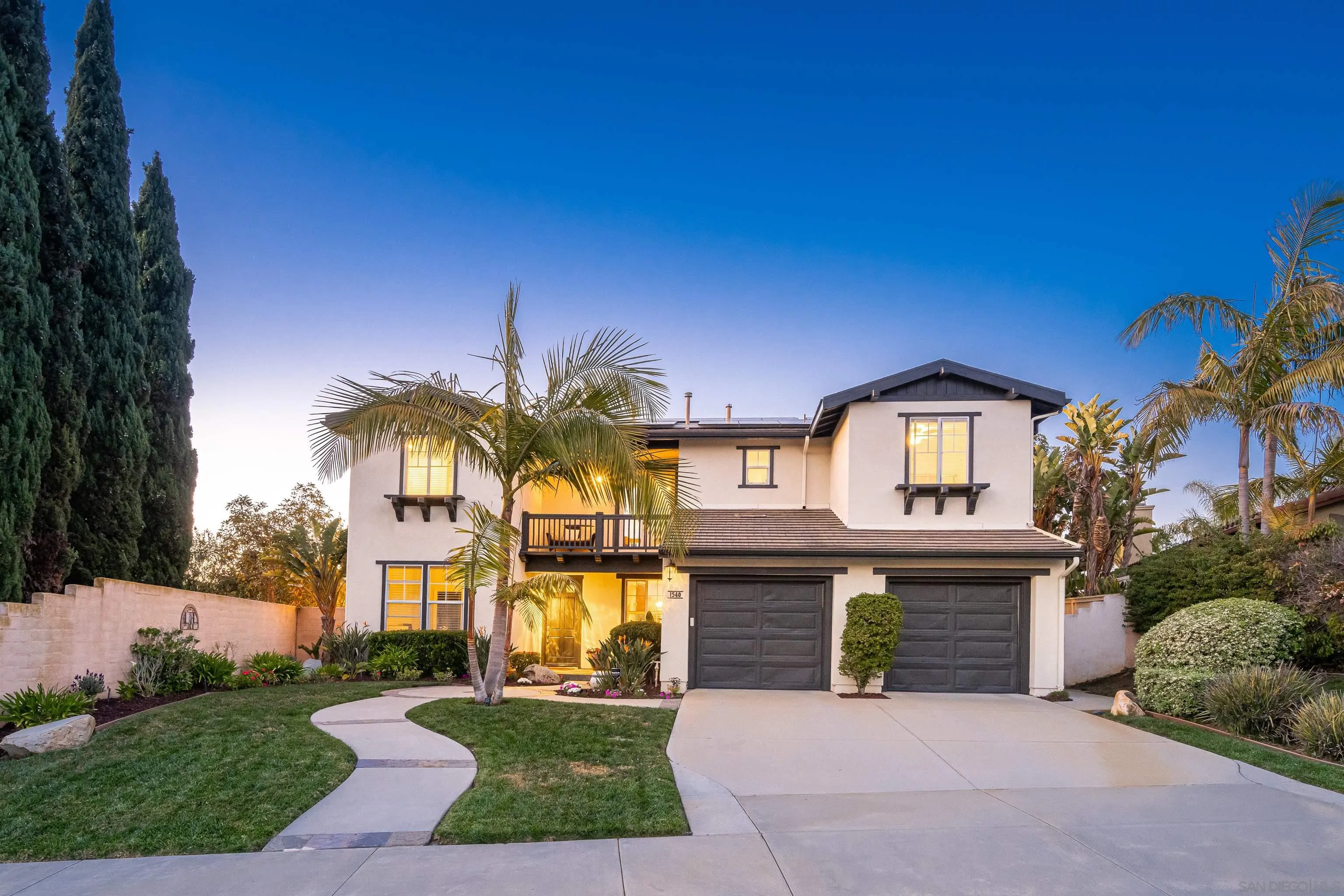 1540 Weatherly Road Carlsbad, CA 92011 - Photo 3 of 58 a view of a house with a yard and potted plants
