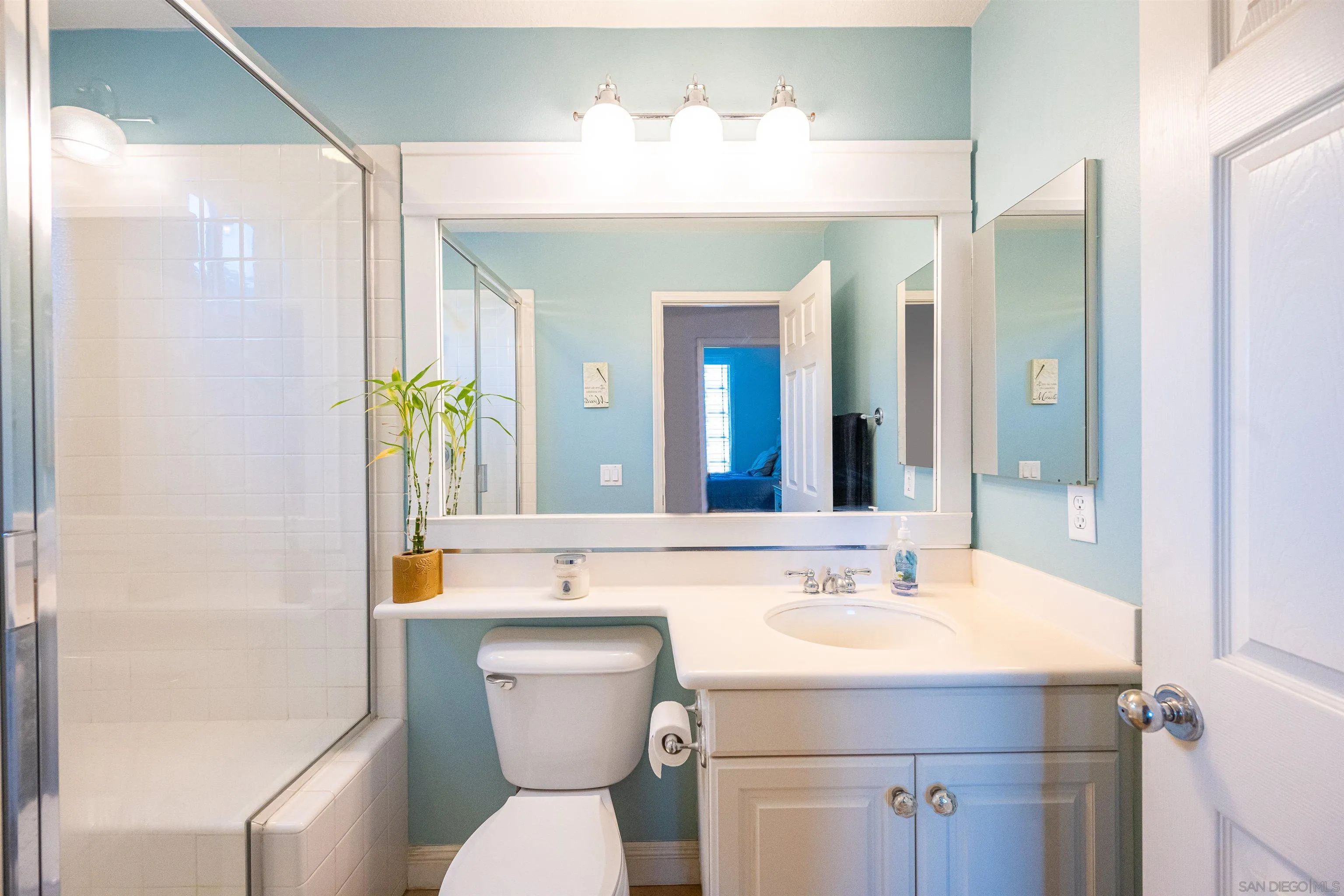 1540 Weatherly Road Carlsbad, CA 92011 - Photo 36 of 58 a bathroom with a sink toilet and shower