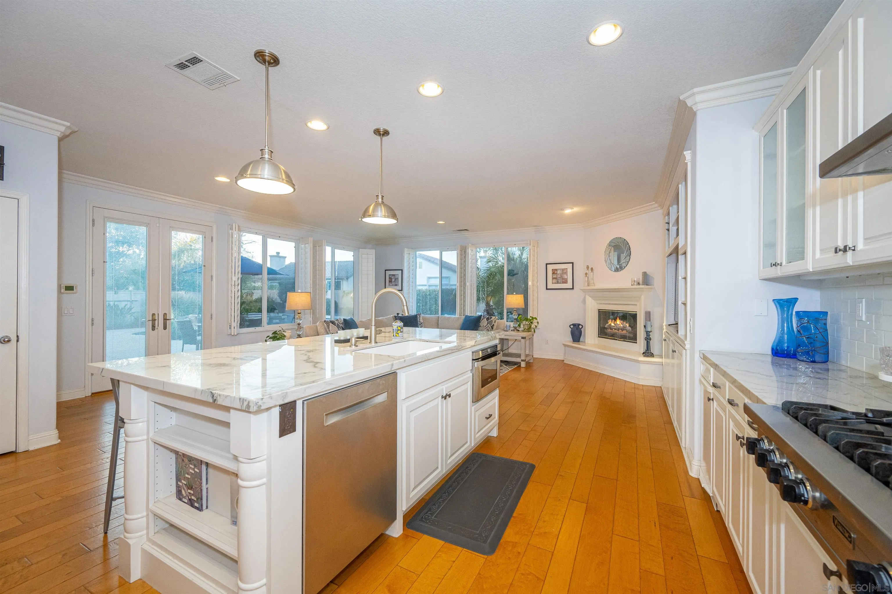 1540 Weatherly Road Carlsbad, CA 92011 - Photo 40 of 58 a large kitchen with stainless steel appliances lots of counter space and a sink