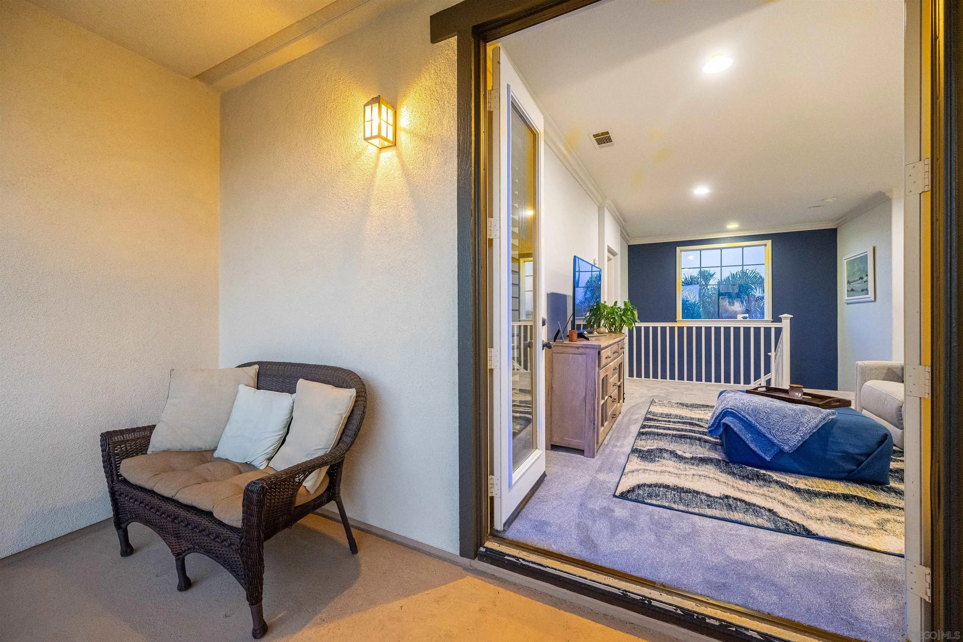 1540 Weatherly Road Carlsbad, CA 92011 - Photo 45 of 58 a living room with furniture and a wooden floor