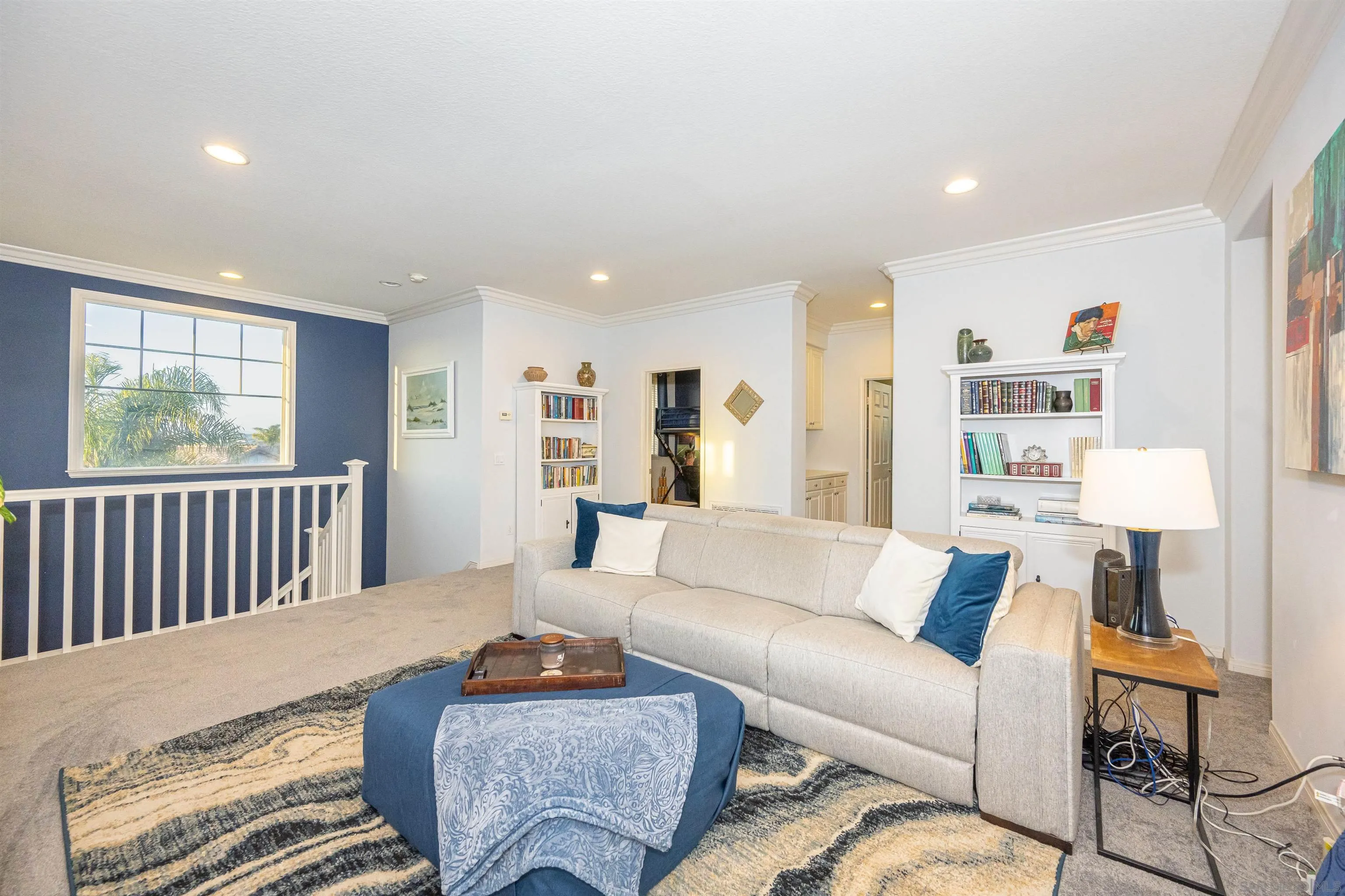1540 Weatherly Road Carlsbad, CA 92011 - Photo 46 of 58 a living room with furniture and a large window