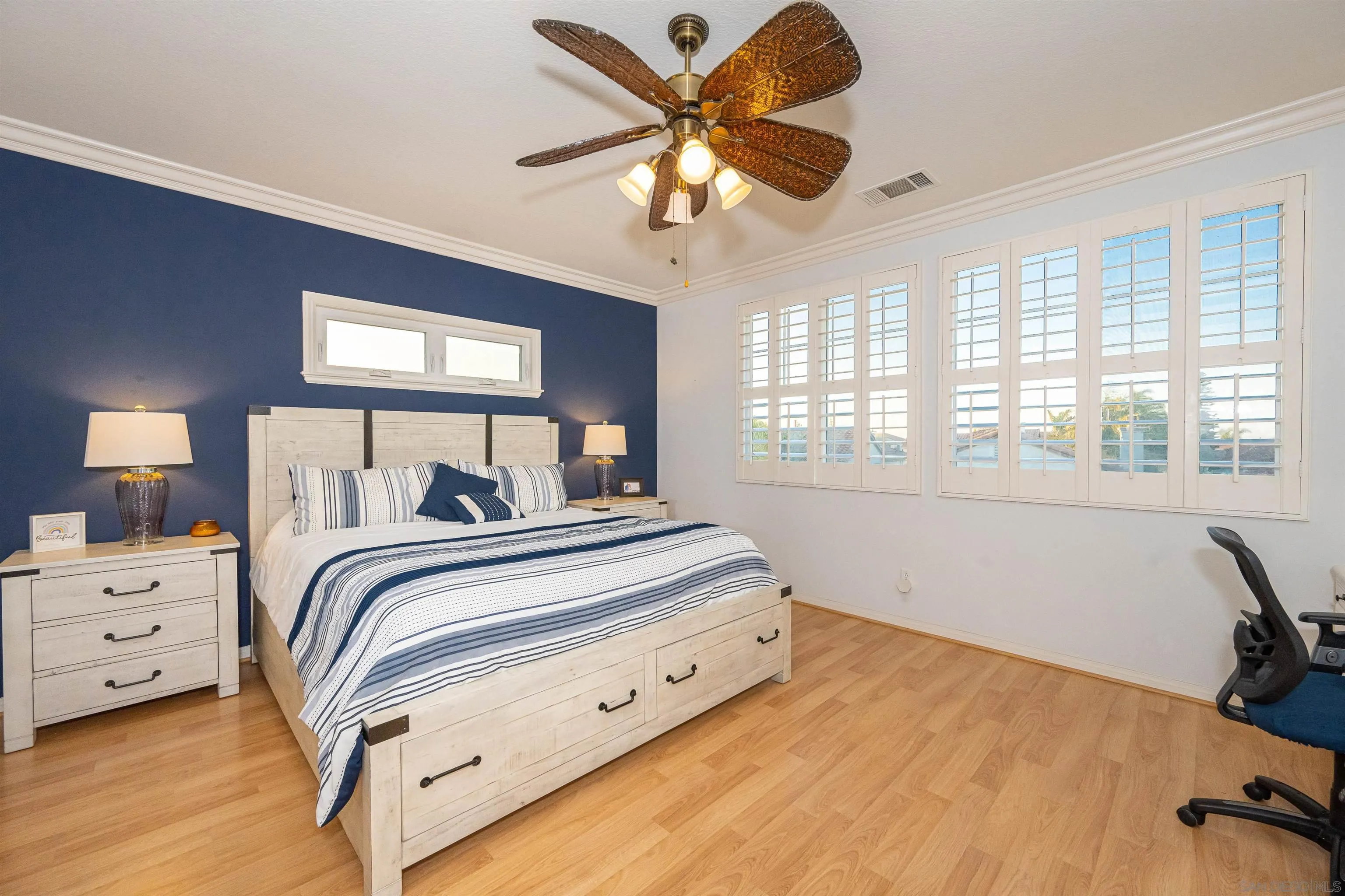 1540 Weatherly Road Carlsbad, CA 92011 - Photo 48 of 58 a bedroom with a bed and a large window
