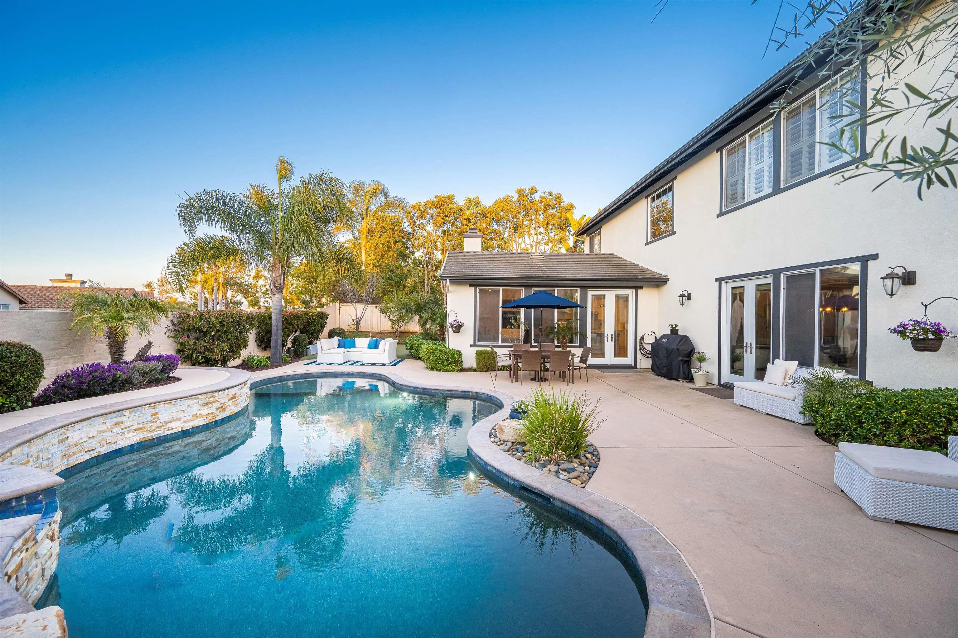 1540 Weatherly Road Carlsbad, CA 92011 - Photo 7 of 58 a view of a house with swimming pool and sitting area