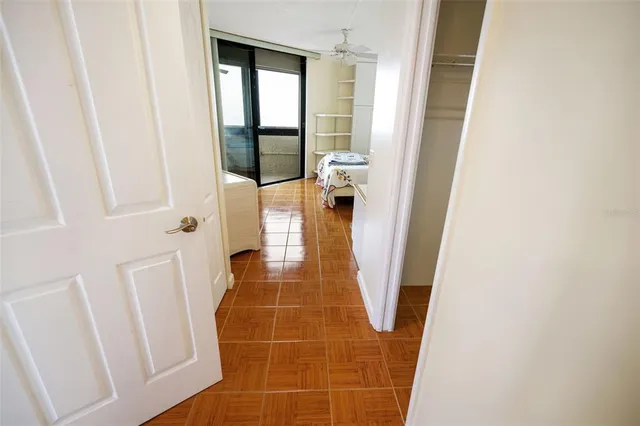 a view of an empty room with a door