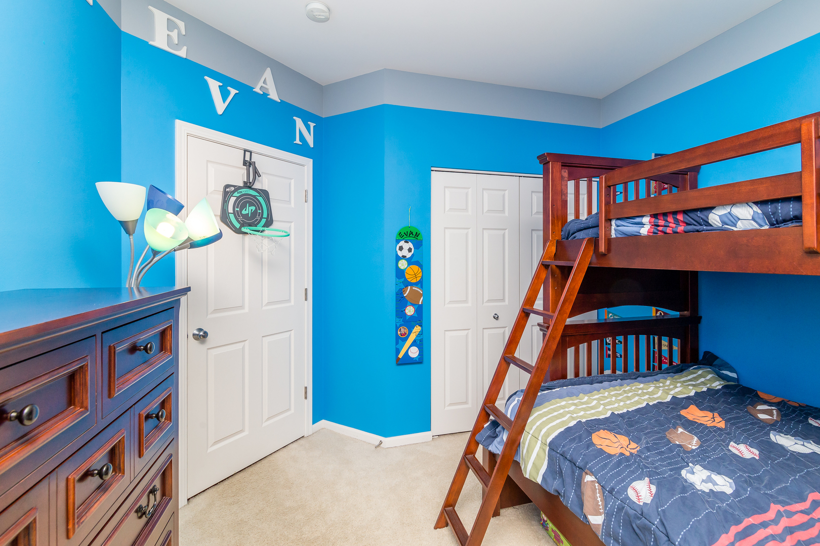 976 Oak Ridge Boulevard Elgin, IL 60120 - Photo 23 of 39 a front view of a house with a bed and toys