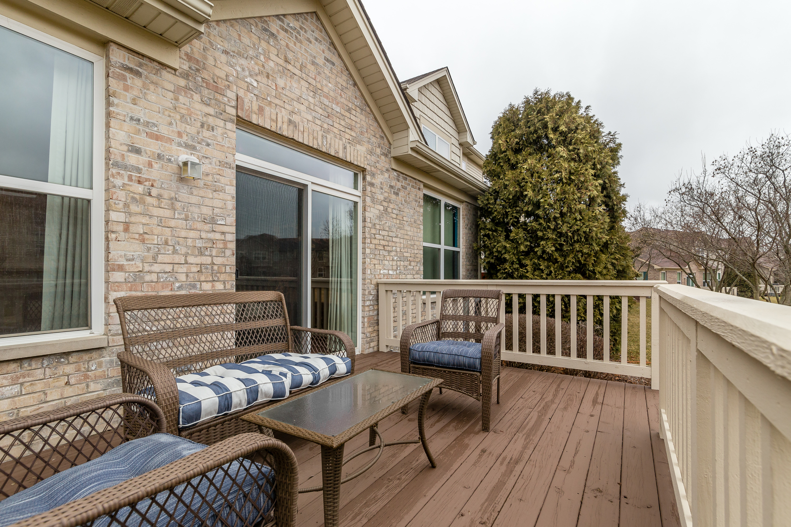 976 Oak Ridge Boulevard Elgin, IL 60120 - Photo 30 of 39 a view of a wooden chairs and table on the deck