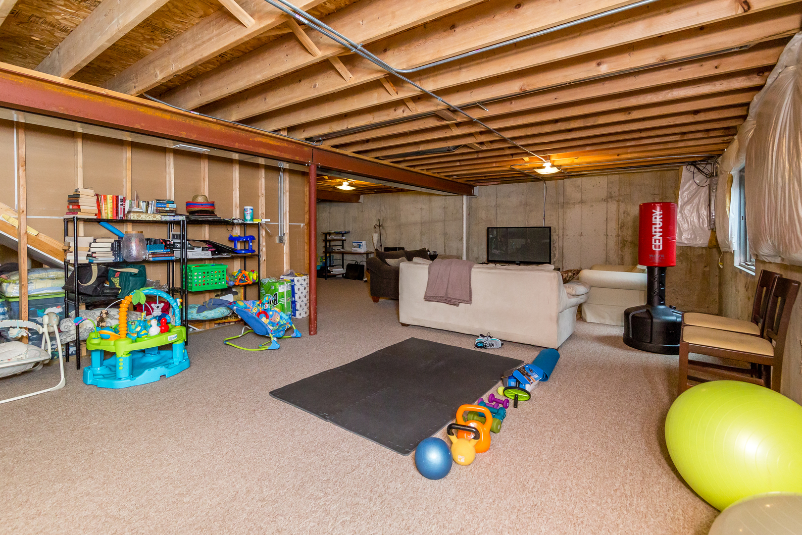 976 Oak Ridge Boulevard Elgin, IL 60120 - Photo 33 of 39 a view of a room with gym equipment