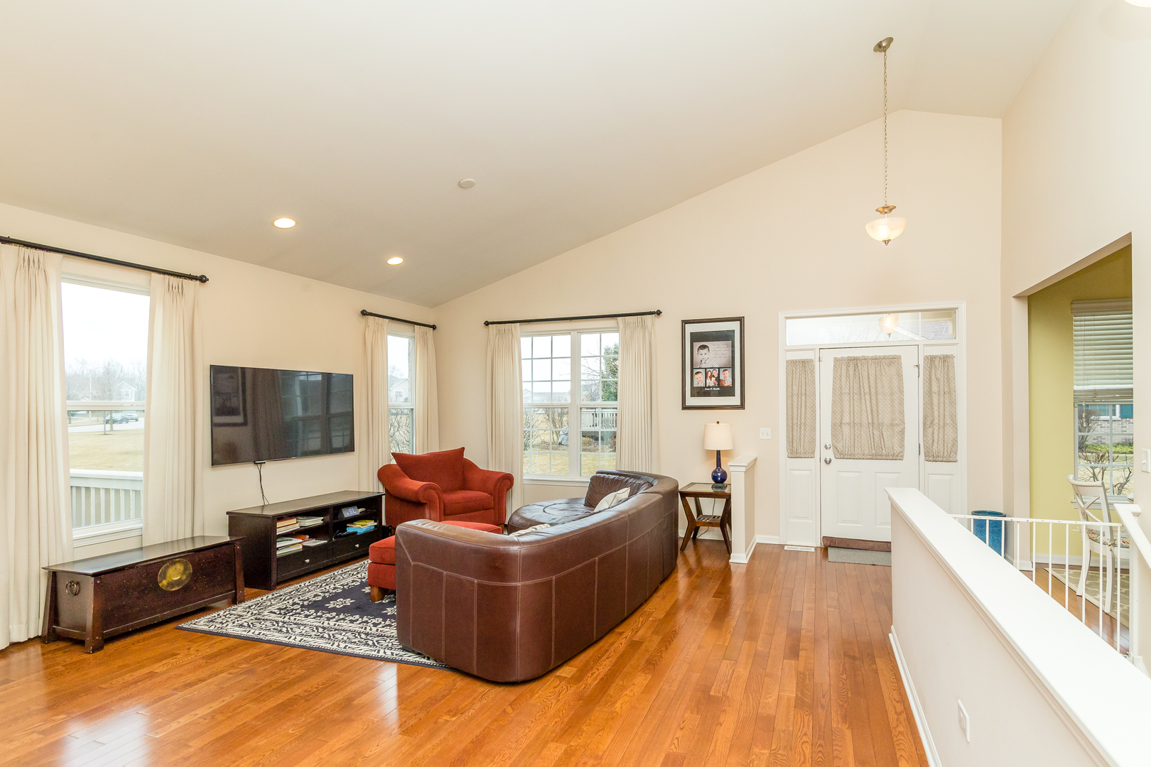 976 Oak Ridge Boulevard Elgin, IL 60120 - Photo 7 of 39 a living room with furniture and a flat screen tv