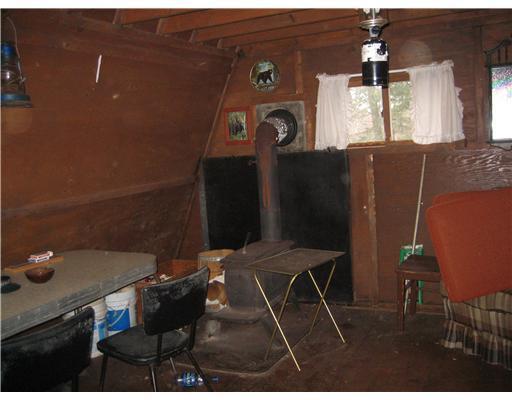 137.8 Owl Road Bethel, ME 04217 - Photo 3 of 13 Interior Space/Layout. Wood Stove