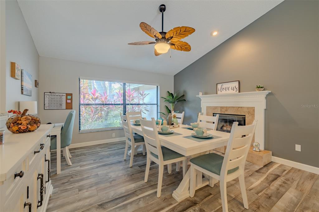 222 Halton Circle Seffner, FL 33584 - Photo 12 of 57 a view of a dining room with furniture and wooden floor