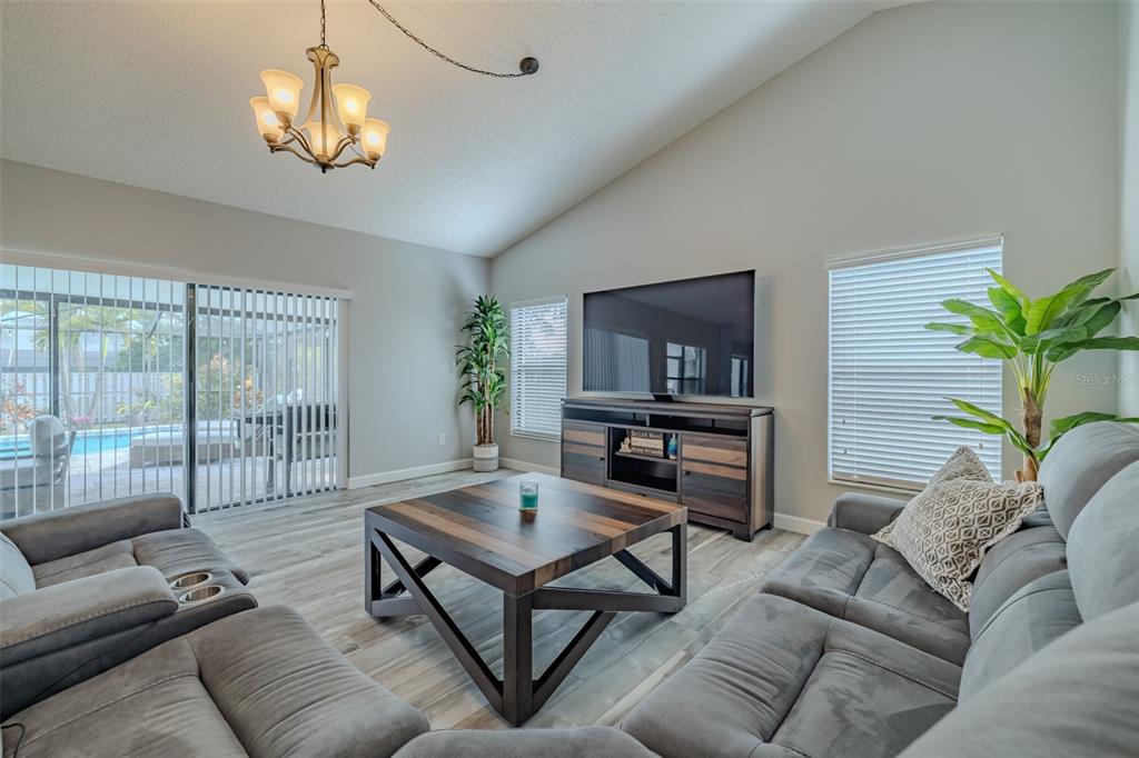 222 Halton Circle Seffner, FL 33584 - Photo 24 of 57 a living room with furniture and a flat screen tv