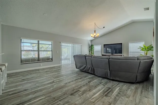 a bathroom with a tub and shower