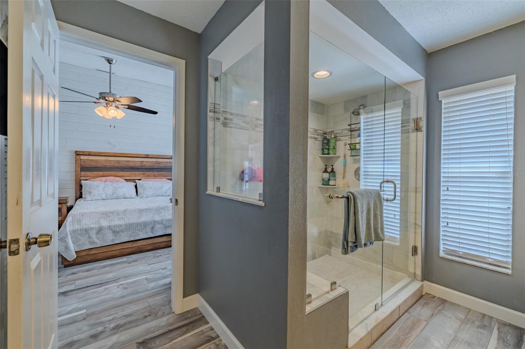 222 Halton Circle Seffner, FL 33584 - Photo 30 of 57 a bathroom with a tub and shower