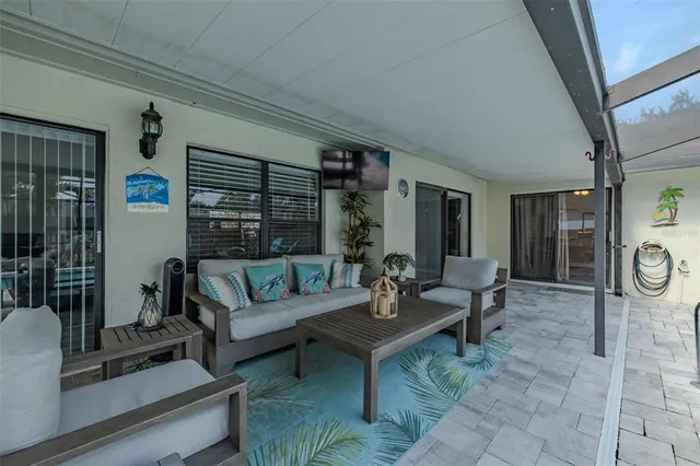 a view of a swimming pool with a patio