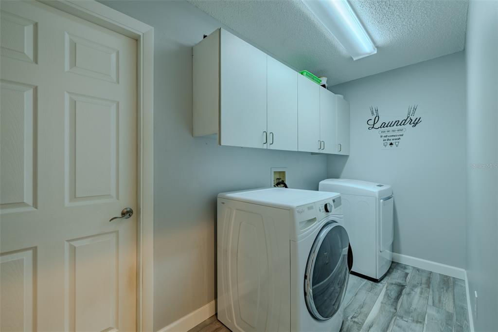 222 Halton Circle Seffner, FL 33584 - Photo 47 of 57 a utility room with dryer and washer