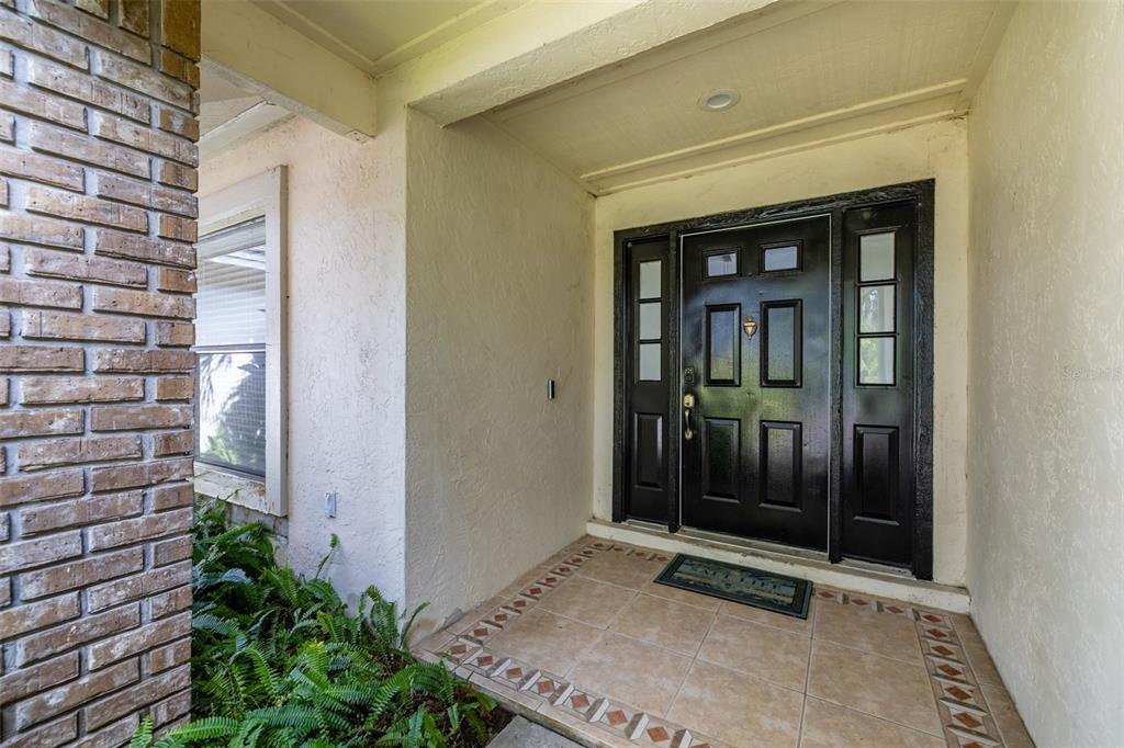 222 Halton Circle Seffner, FL 33584 - Photo 7 of 57 a view of an entrance to house