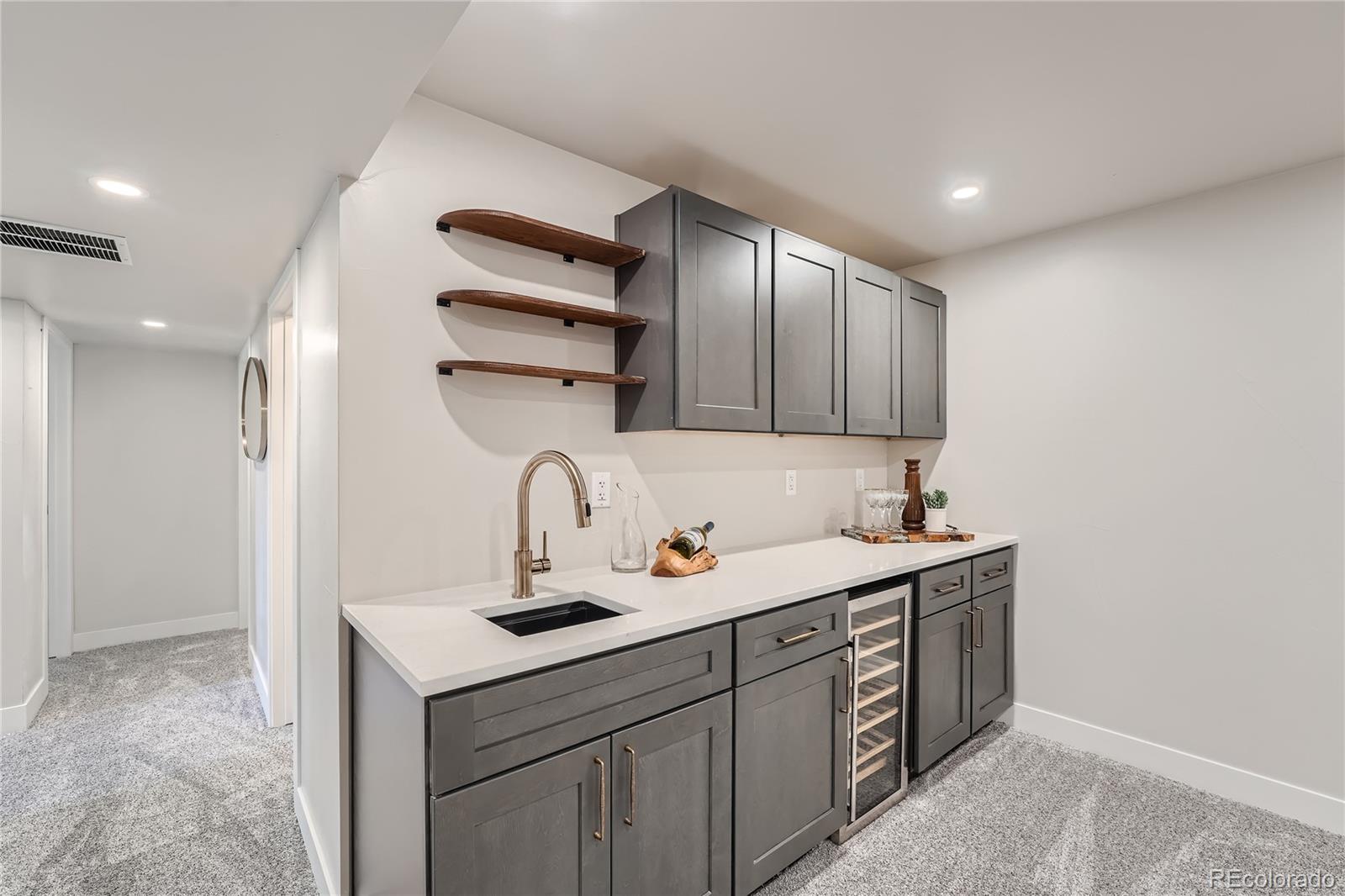 1908 East Street Golden, CO 80401 - Photo 41 of 50 a kitchen with a sink cabinets and appliances