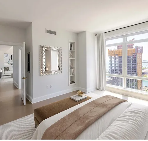 a view of swimming pool with outdoor seating