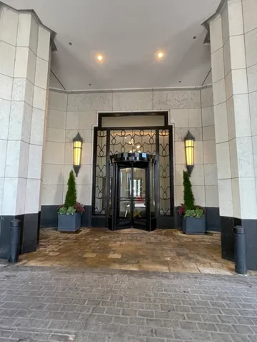 a view of a building with a potted plant