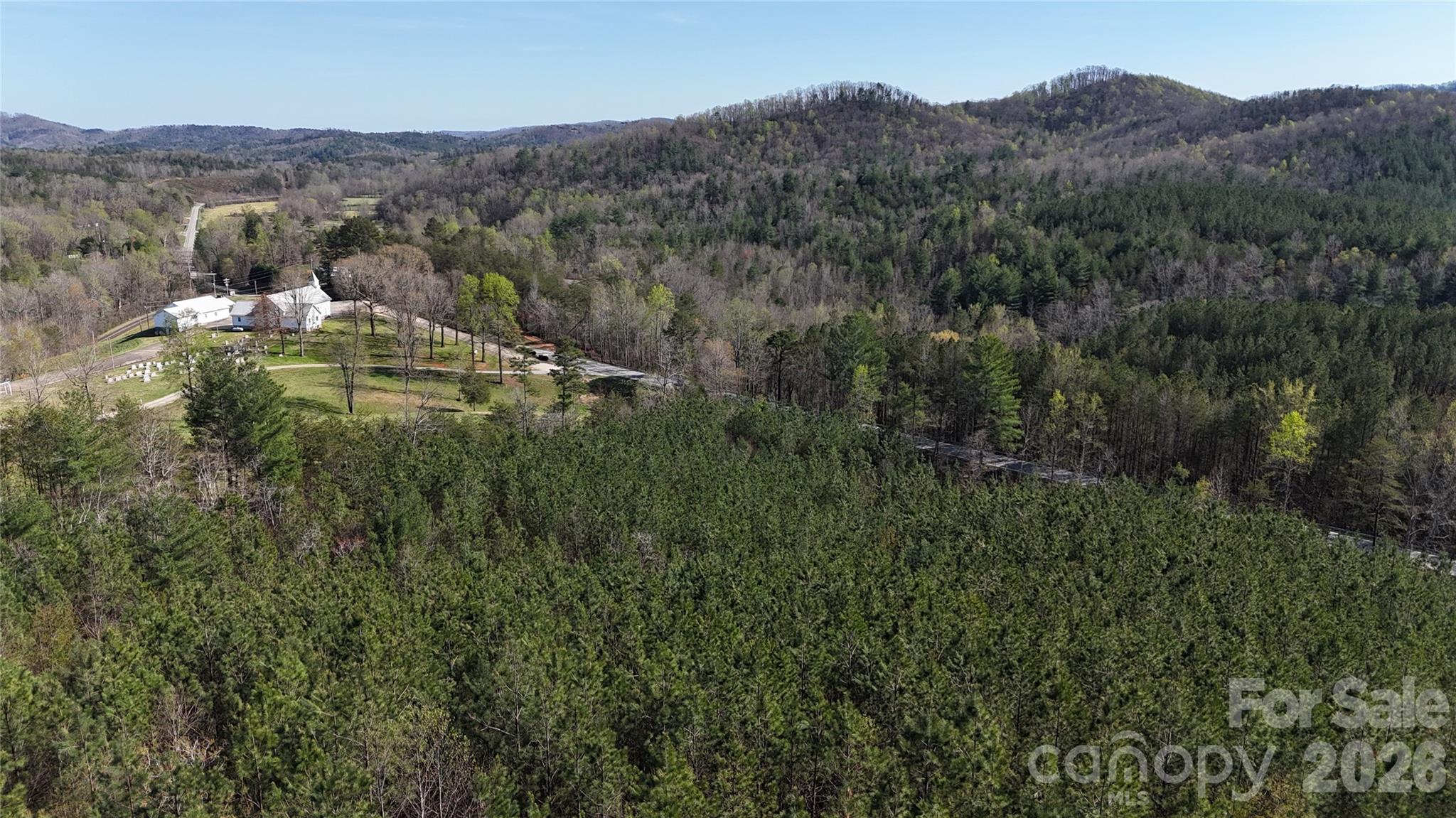 0 Nc Highway Bostic, NC 28018 - Photo 13 of 18 a view of a mountain range with lush green forest