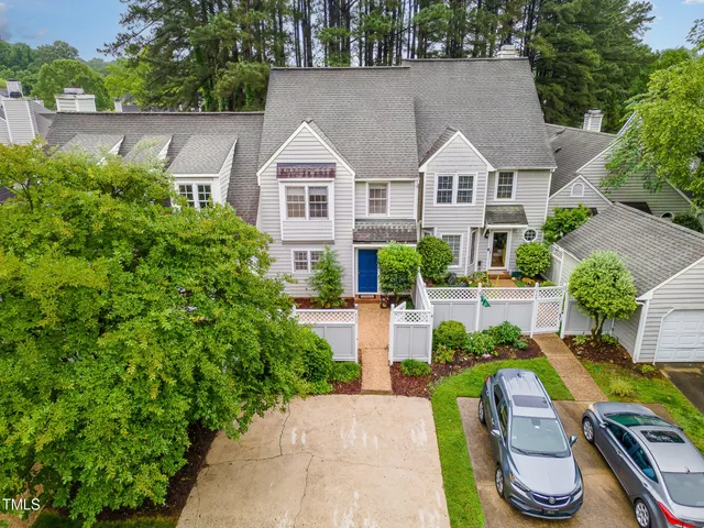 a view of multiple house with garden