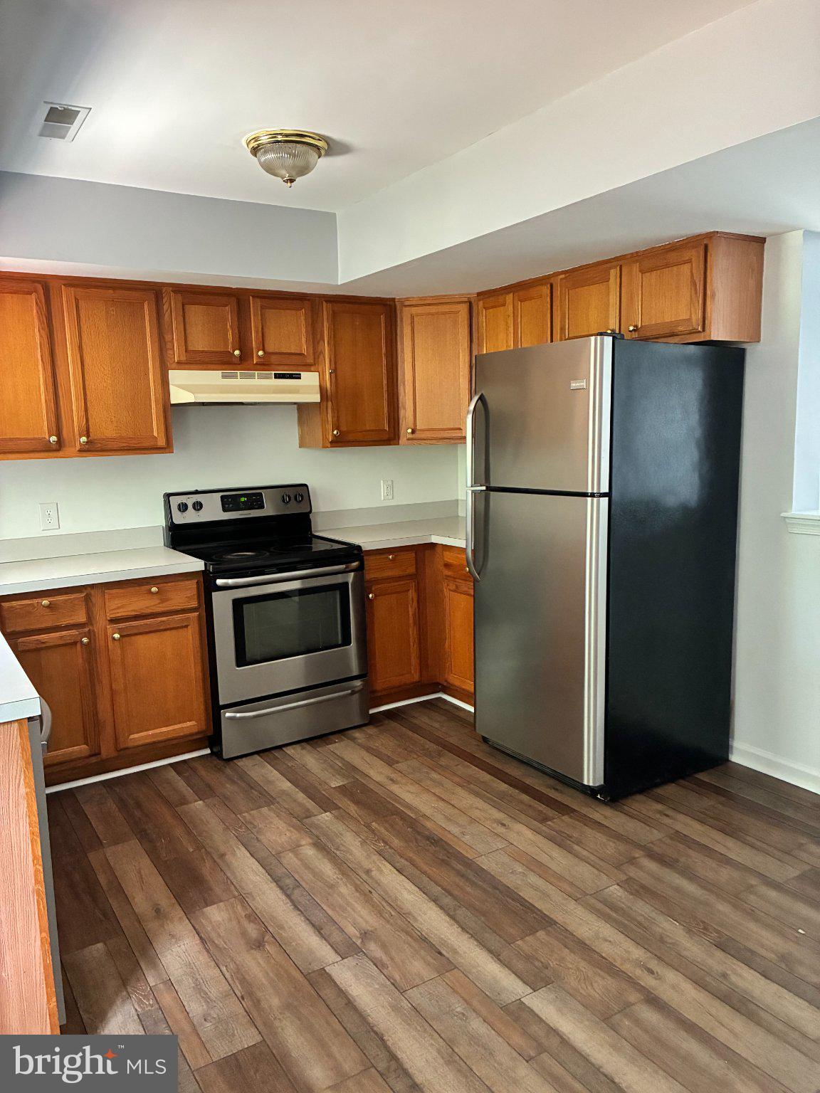 3121 Sundial Road Dover, PA 17315 - Photo 7 of 32 Modern kitchen with warm wood tones.