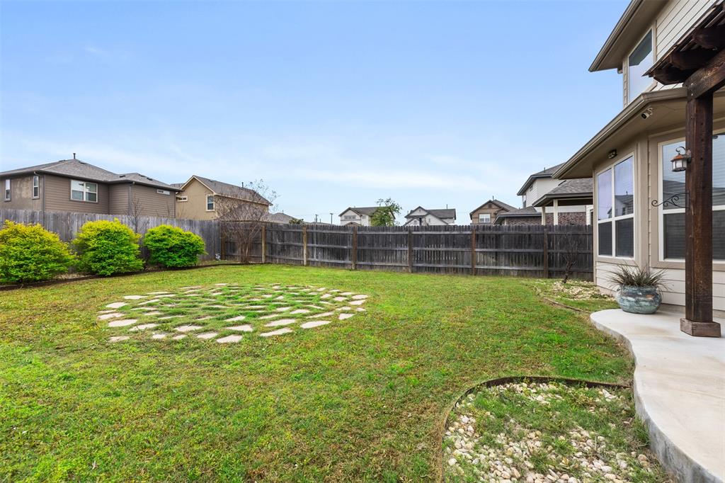 3560 Pauling Loop Round Rock, TX 78665 - Photo 25 of 28 Fenced backyard with a patio area and a residential view