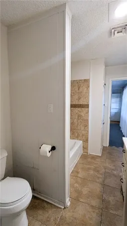 a bathroom with a sink a mirror and shower