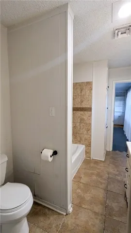 a bathroom with a sink a mirror and shower