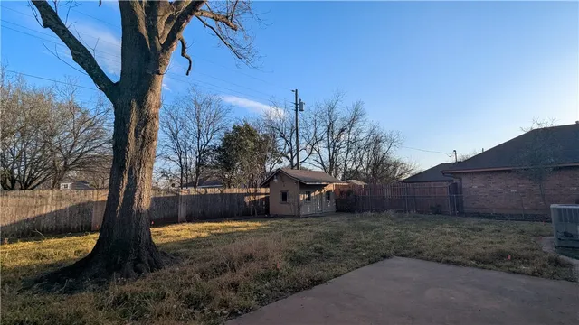 a house view with a swimming pool