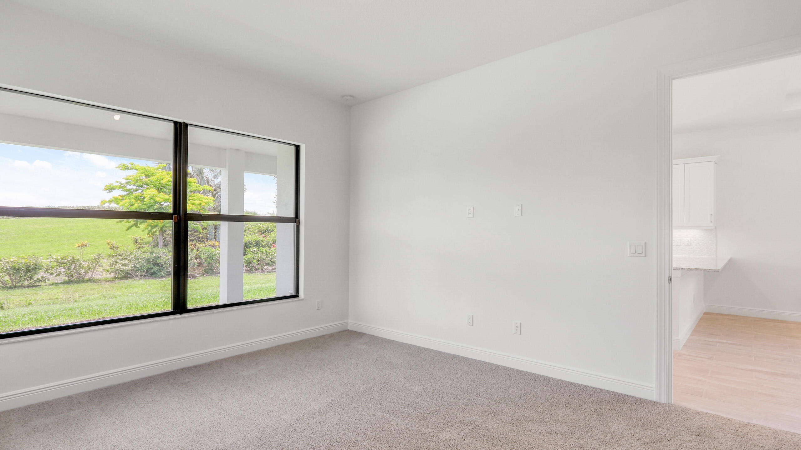 15850 Alys Terrace Westlake, FL 33470 - Photo 17 of 26 an empty room with a window