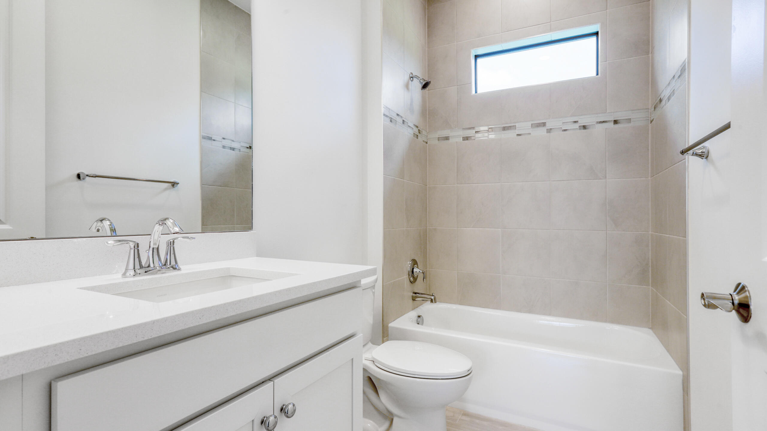 15850 Alys Terrace Westlake, FL 33470 - Photo 22 of 26 a bathroom with a sink a toilet and a bathtub