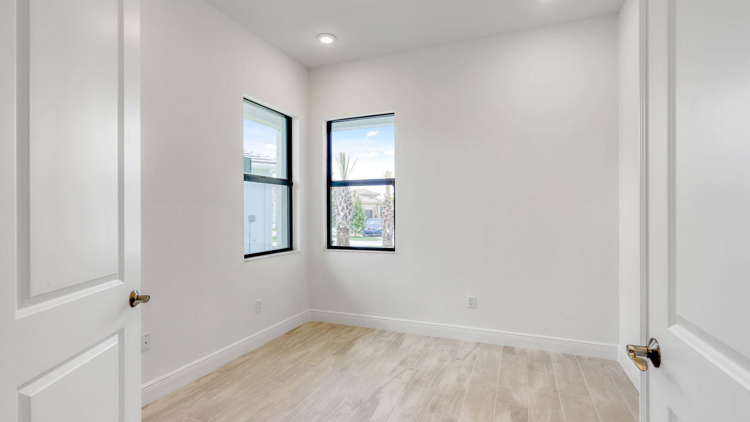 15850 Alys Terrace Westlake, FL 33470 - Photo 6 of 26 a view of an empty room with closet and window