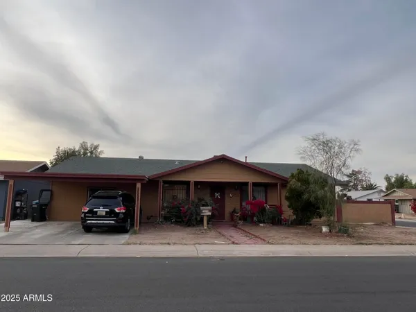 a car parked in front of a house