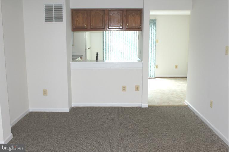 2243 Riding Crop Way Windsor Mill, MD 21244 - Photo 2 of 12 a view of an empty room and window