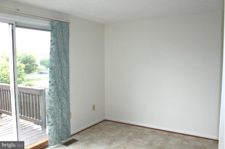 2243 Riding Crop Way Windsor Mill, MD 21244 - Photo 7 of 12 a view of a small space with a window