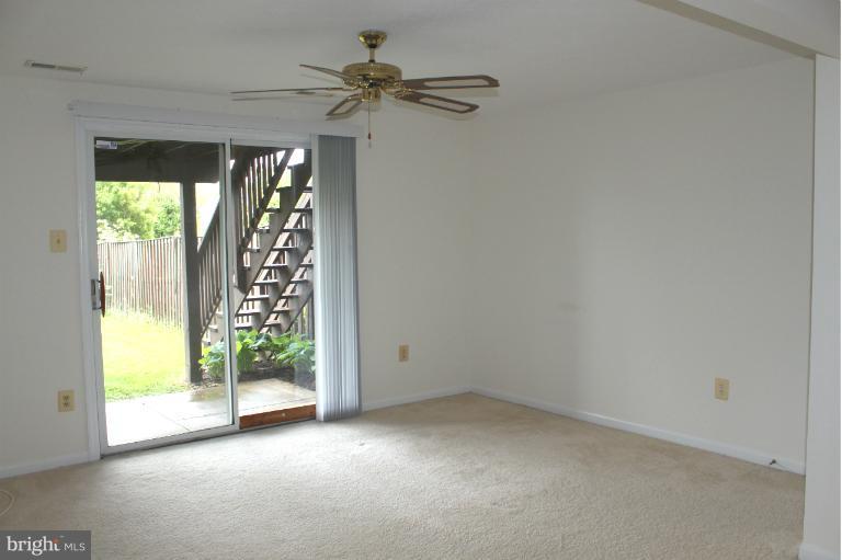 2243 Riding Crop Way Windsor Mill, MD 21244 - Photo 10 of 12 a view of an empty room with a window
