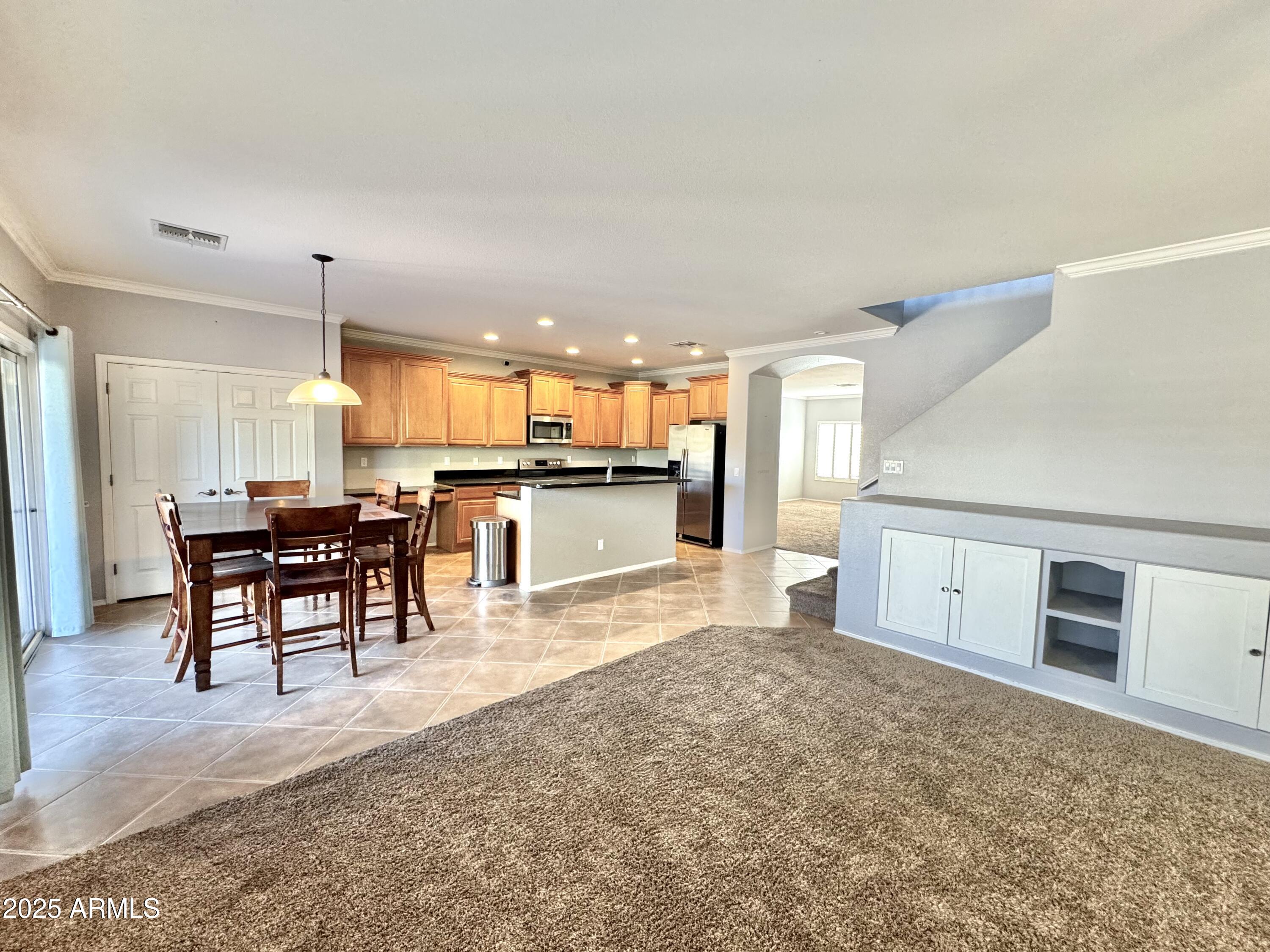 44518 Redrock Road Maricopa, AZ 85139 - Photo 8 of 14 a view of kitchen with furniture and window