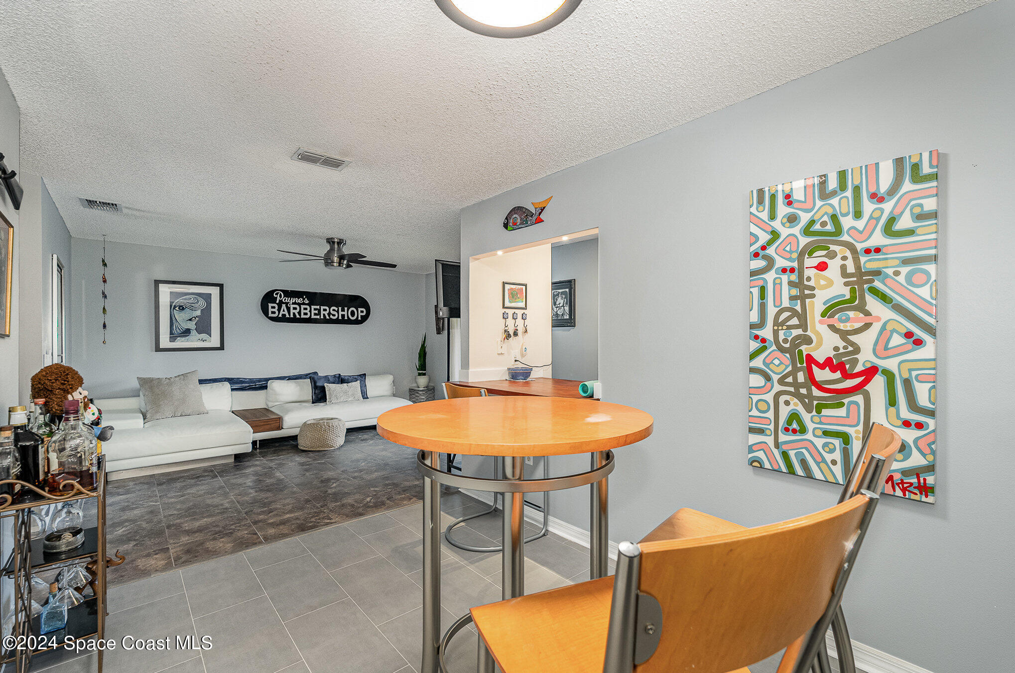 280 Spring Drive, Unit 4 Merritt Island, FL 32953 - Photo 9 of 32 a dining room with a table and chairs
