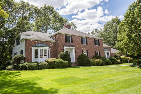 42 Bellevue Road Wellesley, MA 02481 - Photo 1 of 13 a front view of house with yard and green space