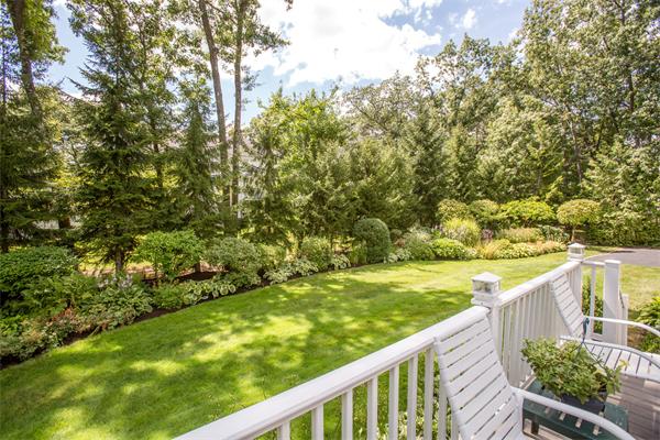 42 Bellevue Road Wellesley, MA 02481 - Photo 12 of 13 a view of a yard with wooden fence