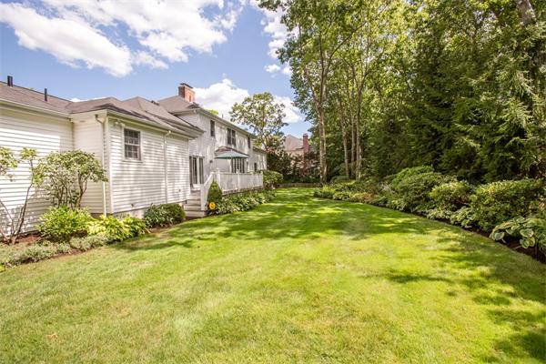 42 Bellevue Road Wellesley, MA 02481 - Photo 13 of 13 a view of a house with a large tree and plants