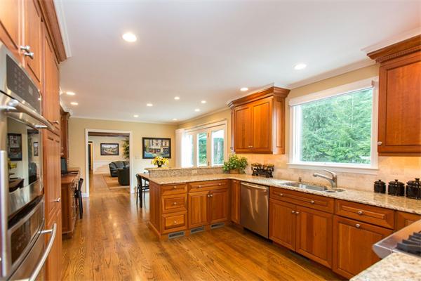 42 Bellevue Road Wellesley, MA 02481 - Photo 5 of 13 a kitchen with lots of counter top space and wooden floor