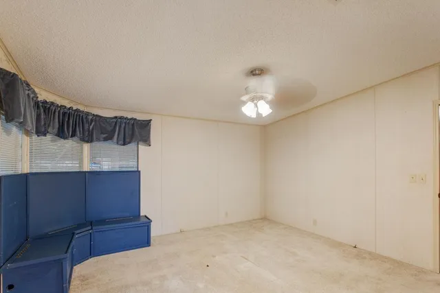 a bathroom with a toilet sink and shower