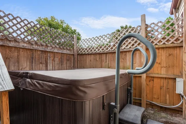 a view of a backyard with small cabin