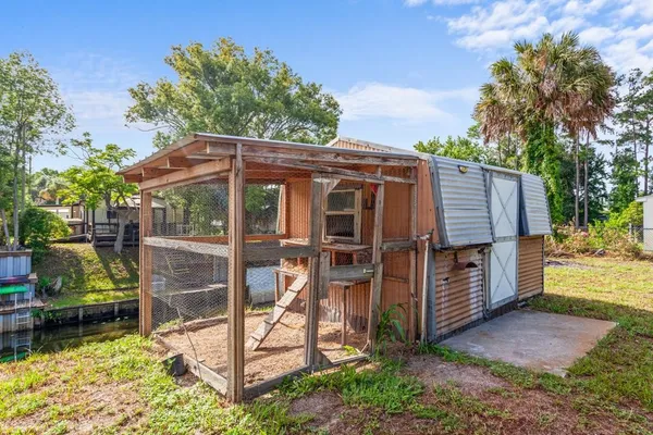a view of living room with wooden floor